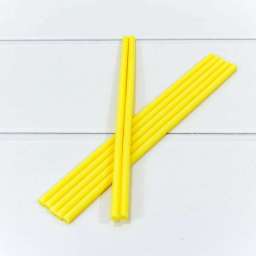 Клей “Термопластичный” (палочка) Жёлтый 0,7см x 25см (1 кг = 102 штуки) 0002016/24